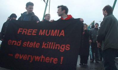 Free Mumia banner at Bloody Sunday march in Derry, Ireland
