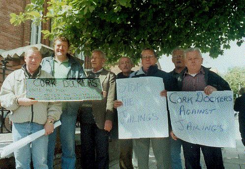 Dockworkers outside the courthouse on Anglesea St., Cork
